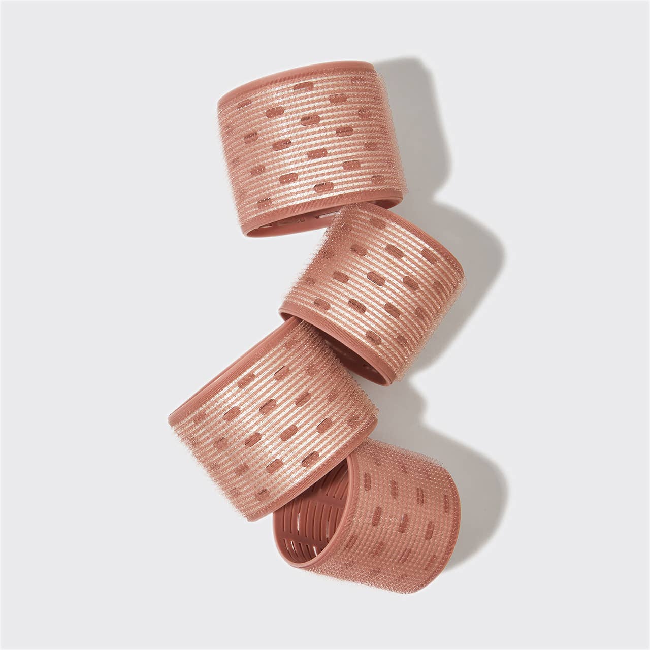 Kitsch XL Thermal Rollers 4pc Set - Terracotta: Achieve big curls with recycled plastic xl thermal rollers.
